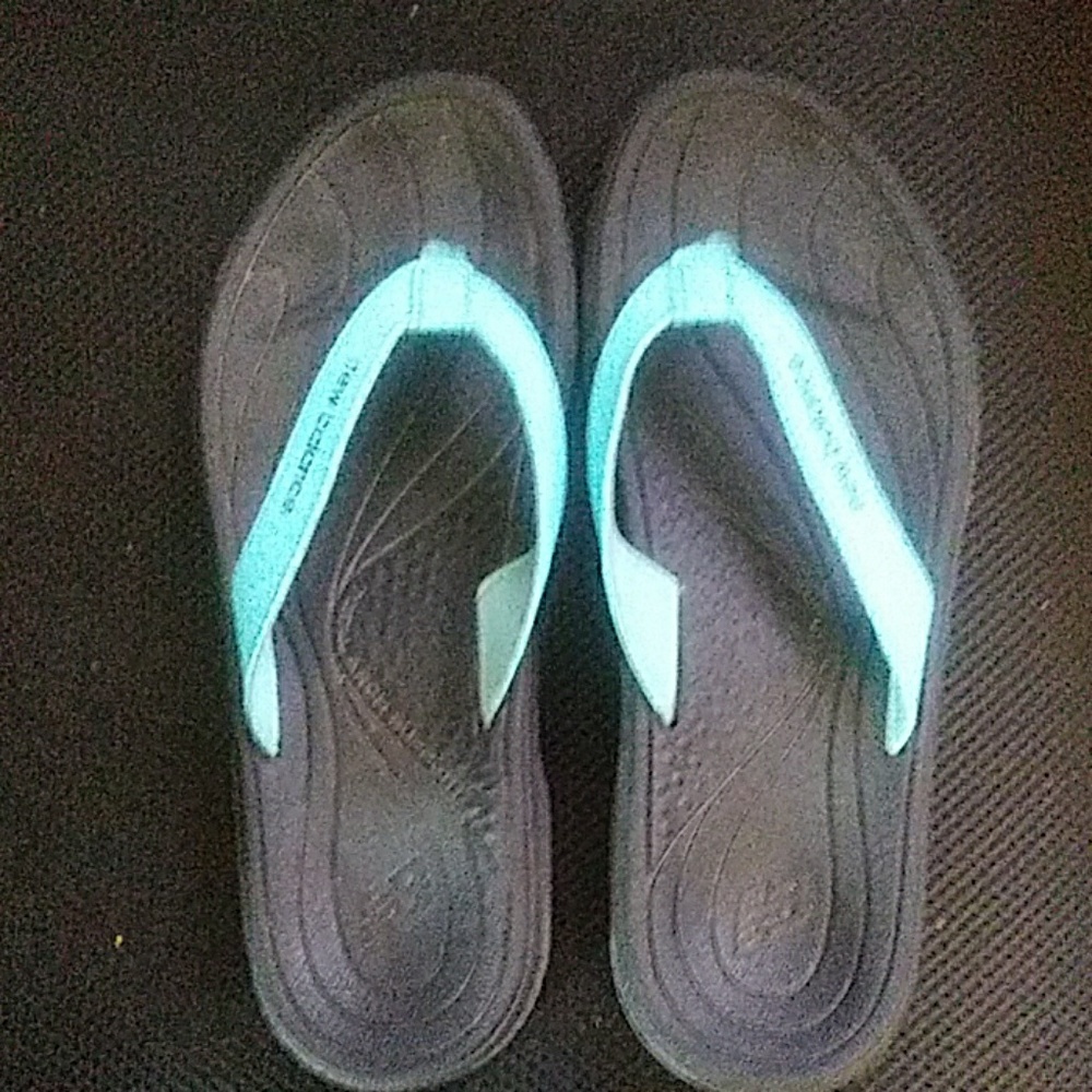 New Balance Kush flip flops.